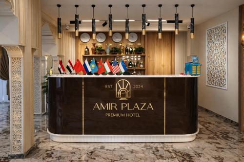 a bar at anarma plaza with a sign on it at AMIR PLAZA hotel in Akmechetʼ