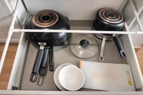 a drawer filled with kitchen utensils at 1Bedroom+Sofa bed, Luxury Condo@Nimmana in Chiang Mai