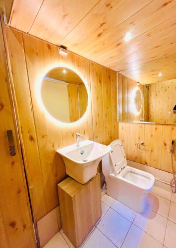 a bathroom with a sink and a toilet at Ballygunge 2BHK 2000sqft flat main road in Kolkata