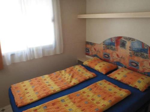 Postel nebo postele na pokoji v ubytování Victoria Camping Bella Austria