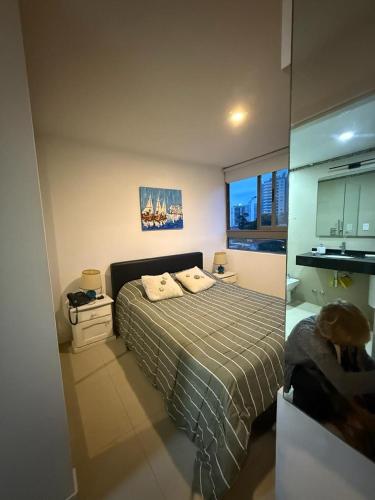 En eller flere senge i et værelse på Chronos brava