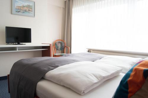 Postel nebo postele na pokoji v ubytování Haus Marquet