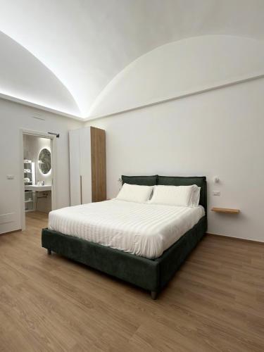 Llit o llits en una habitació de Dimora 281