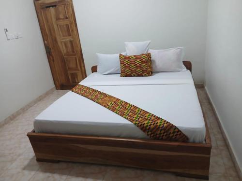 Katil atau katil-katil dalam bilik di Madora Lodge