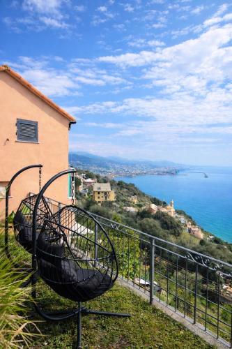 a view of the ocean from a building at Marilú vista mare con giardino in Genoa