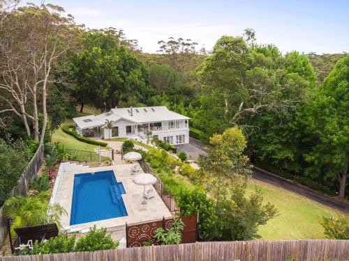 an aerial view of a house with a swimming pool at Casa Scenic MacMasters Beach in Macmasters Beach