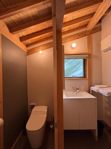 a bathroom with a toilet and a sink at Tiny House - Vacation STAY 12059v in Ōtakuchi