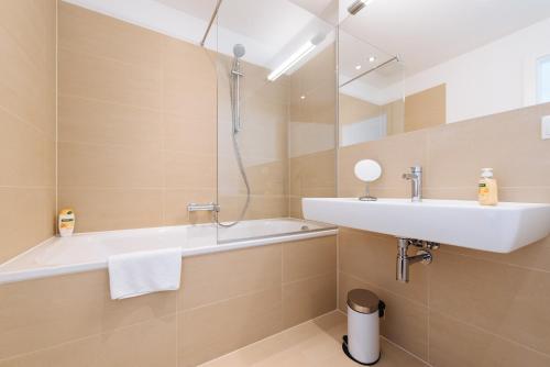 Ванна кімната в Duschel Apartments Wien-Hauptbahnhof