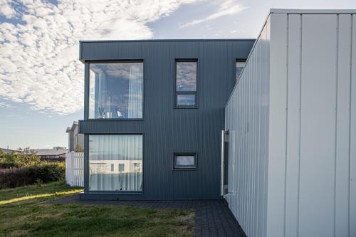 Foto Cosy modern apartment in Kopavogur