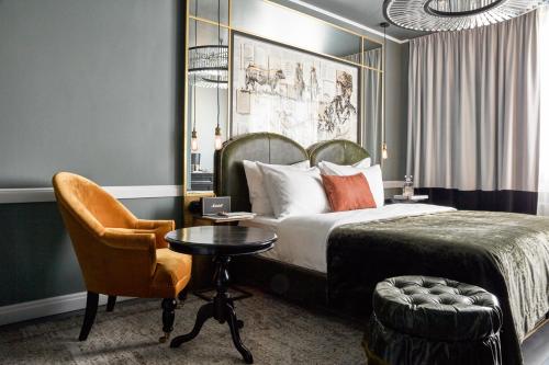 Ein Bett oder Betten in einem Zimmer der Unterkunft Sir Savigny Hotel, part of Sircle Collection