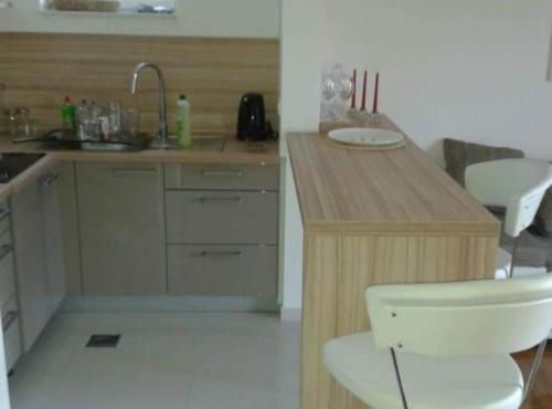 a kitchen with a sink and a counter with a toilet at Villa Ivan Vodice in Vodice