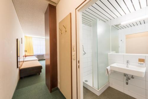 Ванная комната в Benediktushaus im Schottenstift