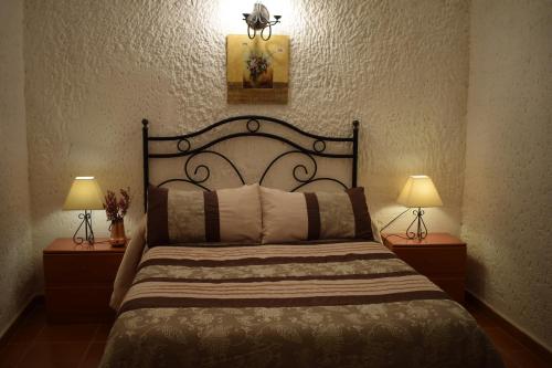Ένα ή περισσότερα κρεβάτια σε δωμάτιο στο Apartamentos Horno y Casa De Dulce
