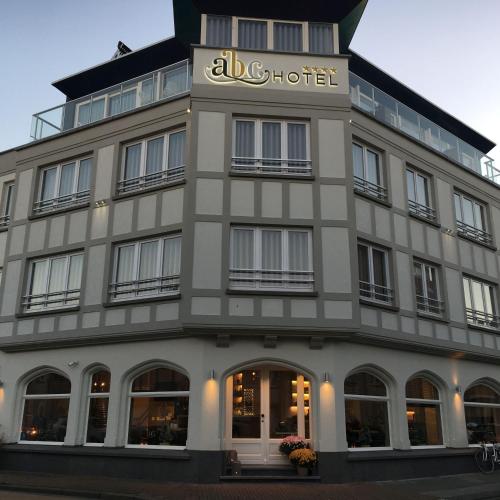 a building with a sign on top of it at ABC Hotel in Blankenberge