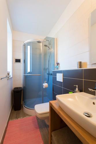 Koupelna v ubytování Apartment Kancler