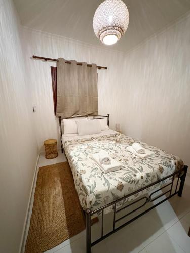 a bedroom with a bed in a room at Gorgyra - Boutique Apartment in Karlovasi