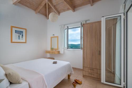 Posteľ alebo postele v izbe v ubytovaní Schiza Houses