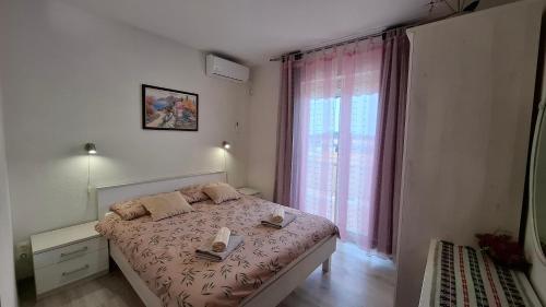 Llit o llits en una habitació de Villa Ivan