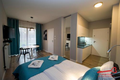 Posteľ alebo postele v izbe v ubytovaní Apartments Nearto Old Town Rakowicka