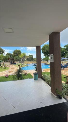 a view of a swimming pool from a building at Day Use in Cascavel
