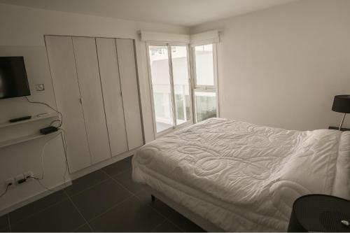 Postelja oz. postelje v sobi nastanitve Bonaire Home & Rental