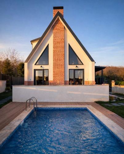 Garden house with hot pool and nature and sea views