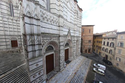 Фотография из галереи Palazzo del Magnifico B&B в Сиене