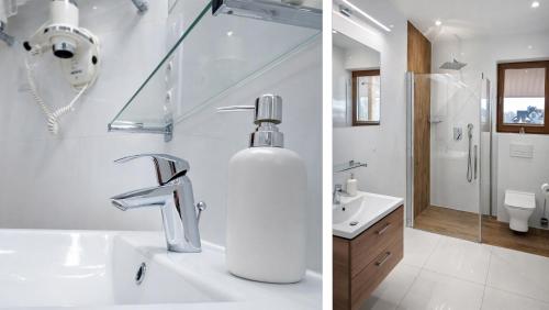 a bathroom with a sink and a soap dispenser at Agroturystyka Serce Łysicy in Święta Katarzyna