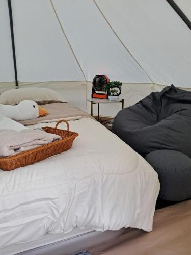a bedroom with a bed and a tent at Infinite horizon nan in Ban San Khet Yao