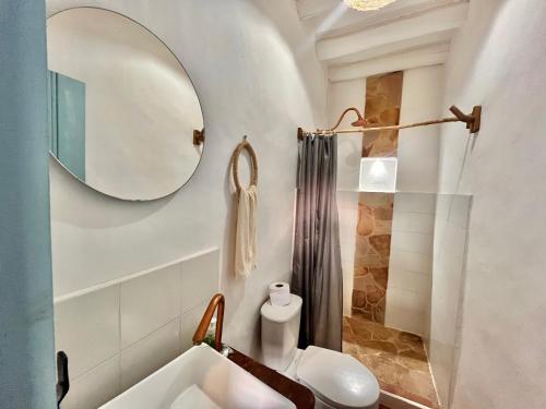 a bathroom with a sink and a mirror at Casa Quintanilla Barichara in Barichara