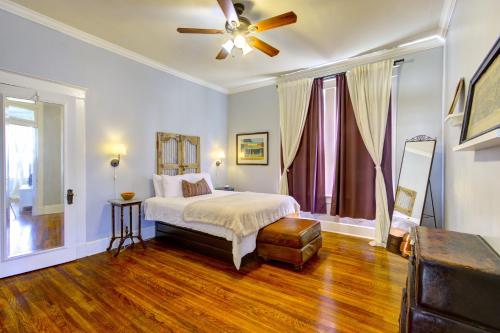 a bedroom with a bed and a ceiling fan at Elegant Colonial with Lovely Details and Character in Memphis