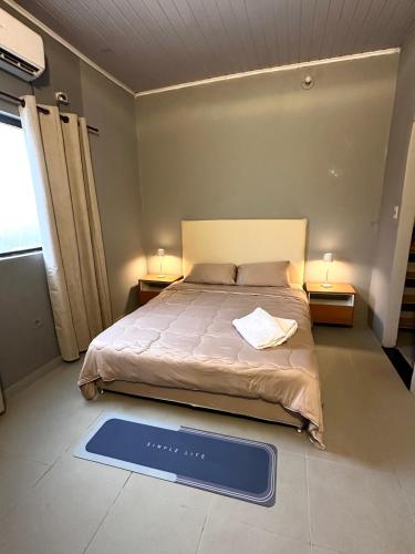 Postel nebo postele na pokoji v ubytování CDE House