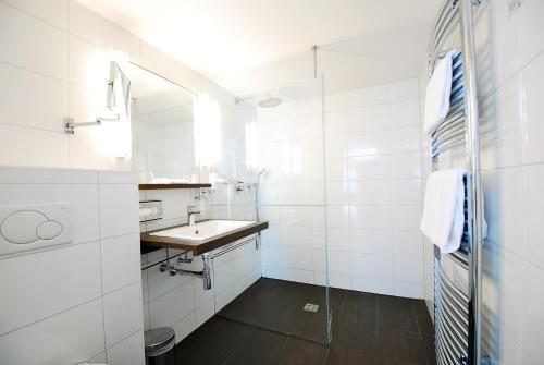Koupelna v ubytování Hotel Germania