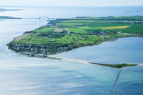 an aerial view of an island in the water at Hotel Sonneninsel Fehmarn in Fehmarn