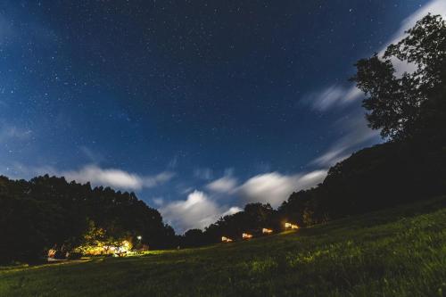 a field at night with a starry sky at Earthboat Minakami Fujiwara in Sudagai
