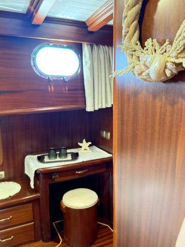 a small bathroom with a toilet and a sink at Caicco Silver Star 2 by Blue Marine in Lampedusa