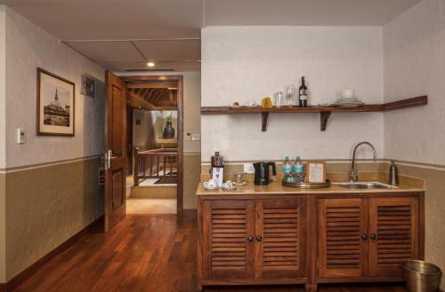 a kitchen with a sink and a counter top at Nepali Ghar Hotel, Thamel - Your Home In Nepal in Kathmandu