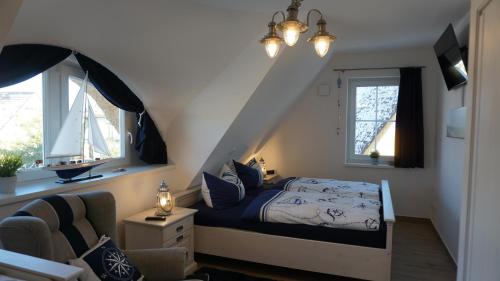 سرير أو أسرّة في غرفة في Reethaus Casa Baltica