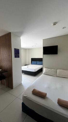 Llit o llits en una habitació de Tiana Tower