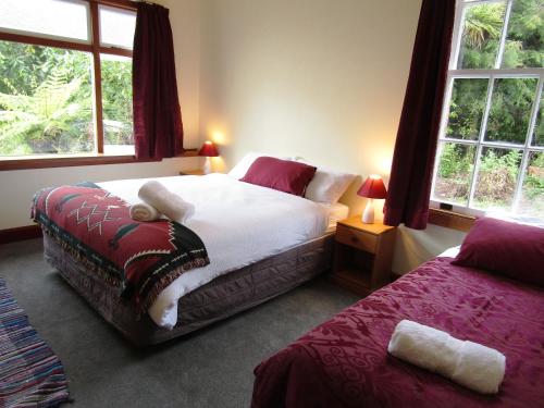 Katil atau katil-katil dalam bilik di Greenstone Retreat