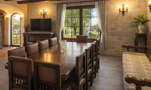 a large dining room with a large table and chairs at Casa Rural Ivanrey in Ivanrey