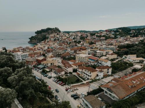 an aerial view of a town next to the ocean at Milto's Studios in Parga