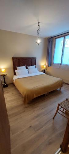 Llit o llits en una habitació de Gîte de L'estiu