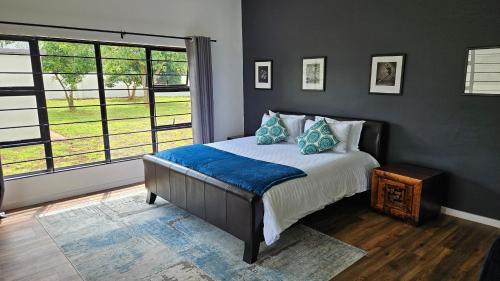 Llit o llits en una habitació de Villa Bella