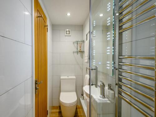 a bathroom with a toilet and a sink at 1 Bed in Christchurch oc-90444 in Highcliffe