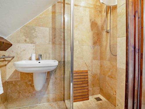 a bathroom with a sink and a shower at 1 Bed in Wedmore oc-51340 in Chapel Allerton