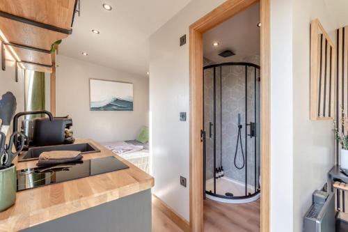 a bathroom with a shower and a sink at 1 Bed in Austwick oc-b37509 in Austwick