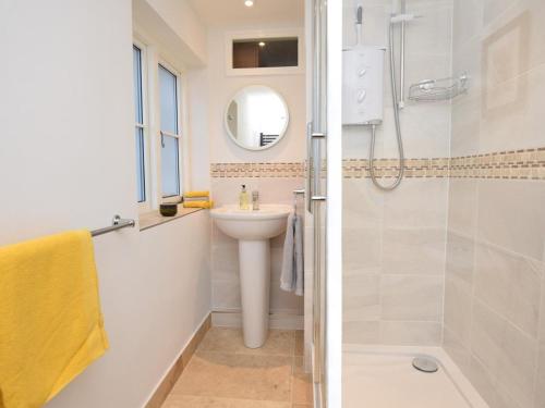 a bathroom with a shower and a sink and a toilet at 2 Bed in Dorchester oc-66192 in Stratton