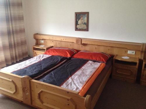 A bed or beds in a room at Landhaus Peer