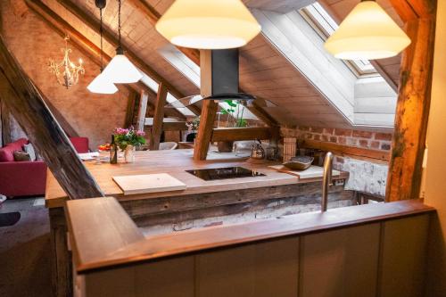 an overhead view of a kitchen in an attic at Gamlebyen Hotell - Fredrikstad in Fredrikstad